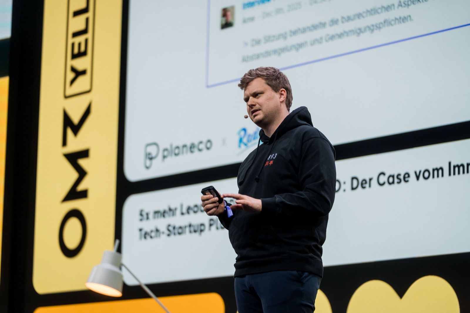 Niklas Buschner speaking on the Yellow Stage at OMR 2026